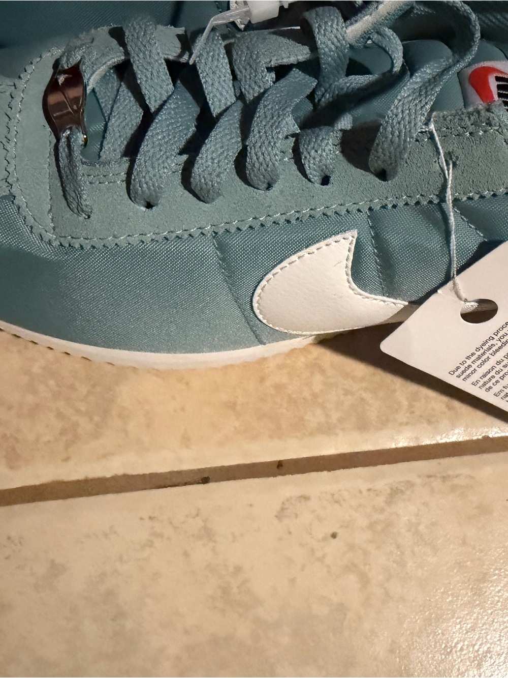 Nike Light Blue Sneaker with White Swoosh
